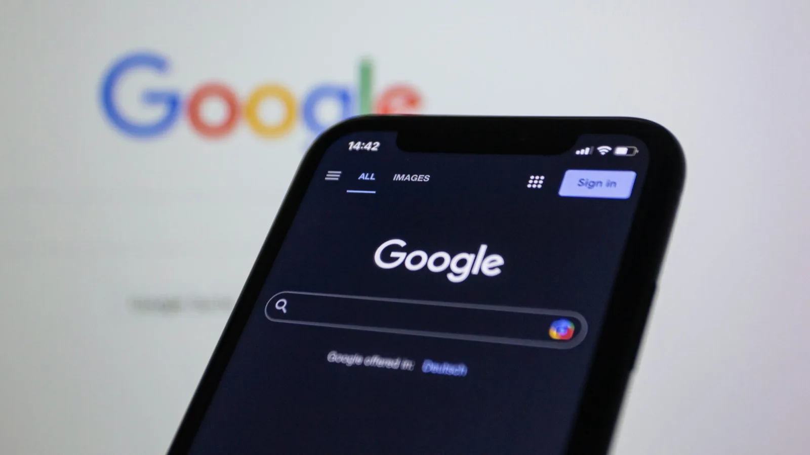 A smartphone displaying a search page